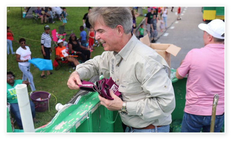 Ray Garofalo handing out koozies to constituents